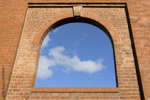 Arch window in the brick wall