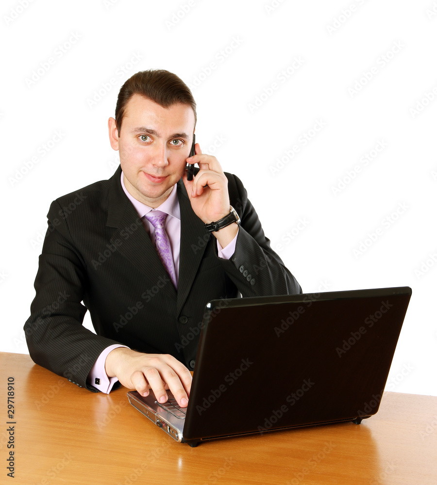 Businessman with laptop and cell phone Businessman with laptop and cell phone