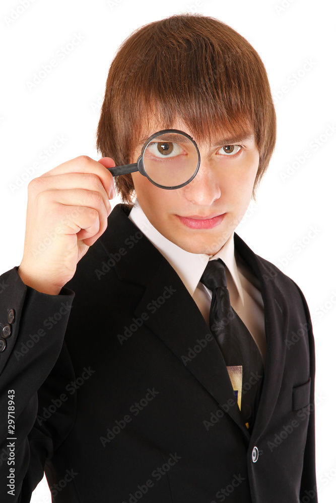 businessman looking through a magnifying glass businessman looking through a magnifying glass