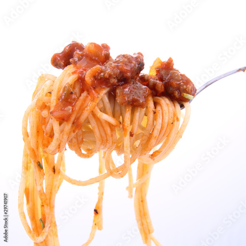 Spaghetti with sauce bolognese hanging on a fork