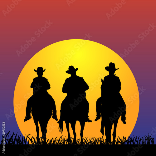 Three Cowboys at sunset