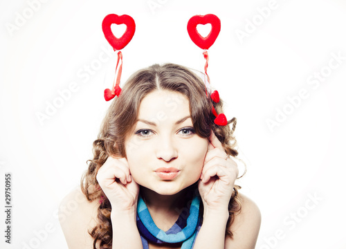 attractive smiling woman with hearts on white background