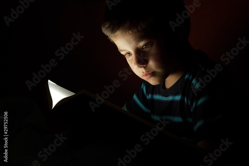 Boy reading bedtime story