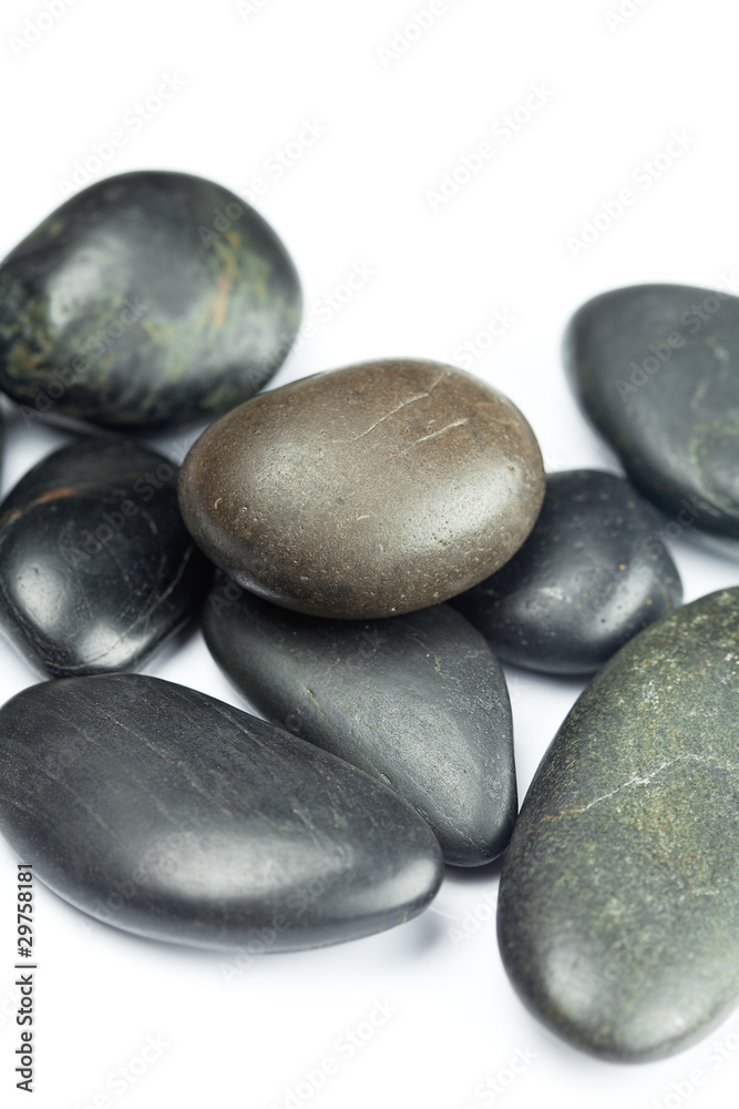 big black spa stones isolated on white big black spa stones isolated on white