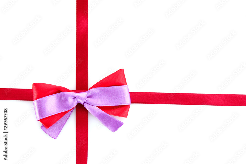 Gift red ribbon and bow isolated on white background Gift red ribbon and bow isolated on white background