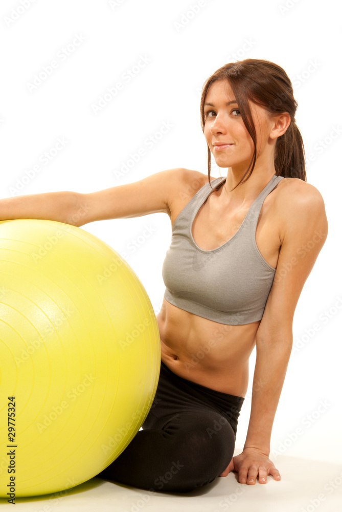 Female fitness instructor with pilates ball Female fitness instructor with pilates ball