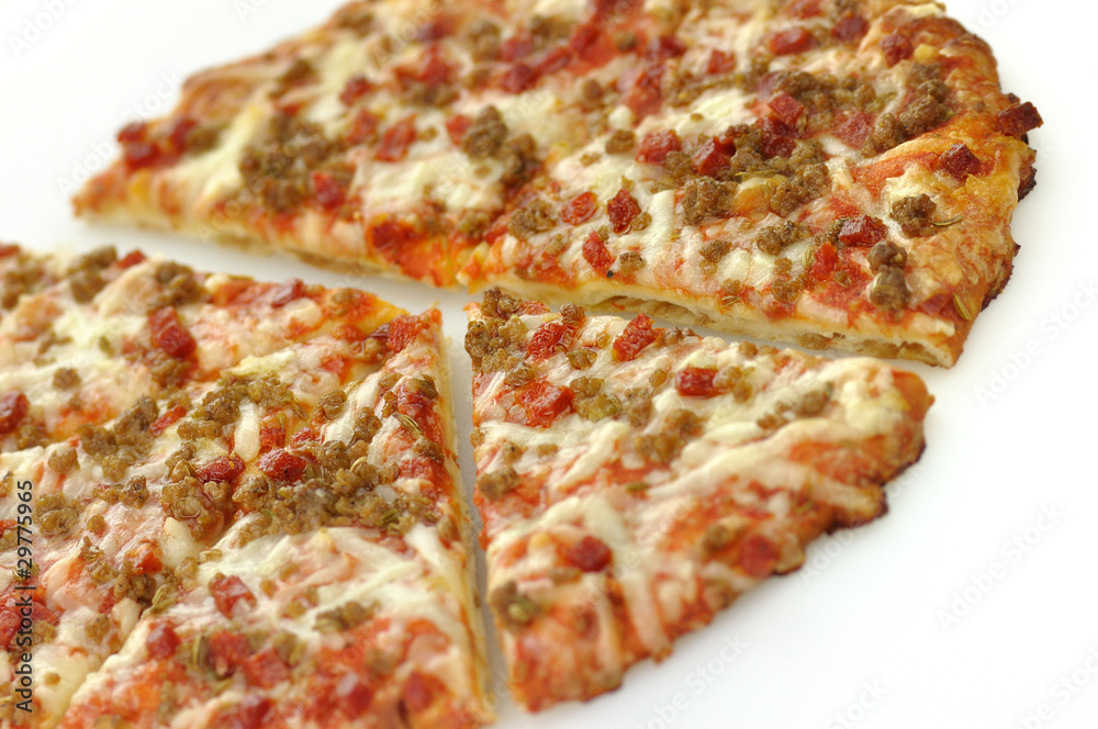 mini pizza topped with sausage and pepperoni mini pizza topped with sausage and pepperoni