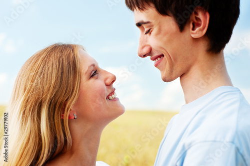 profile portrait of happy couple