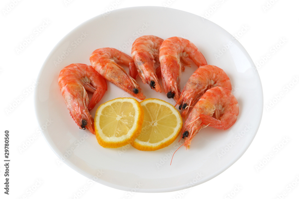 boiled shrimps with lemon on a plate boiled shrimps with lemon on a plate