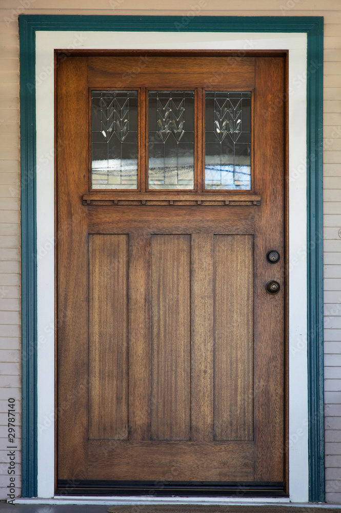 Naklejka premium Decco glassed stained wood door