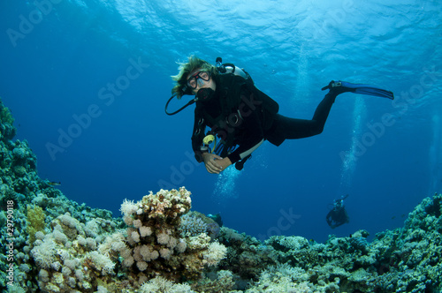 scuba divers decend on to dive site © JonMilnes