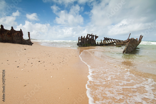 Fototapeta wreck on australian beach during the day