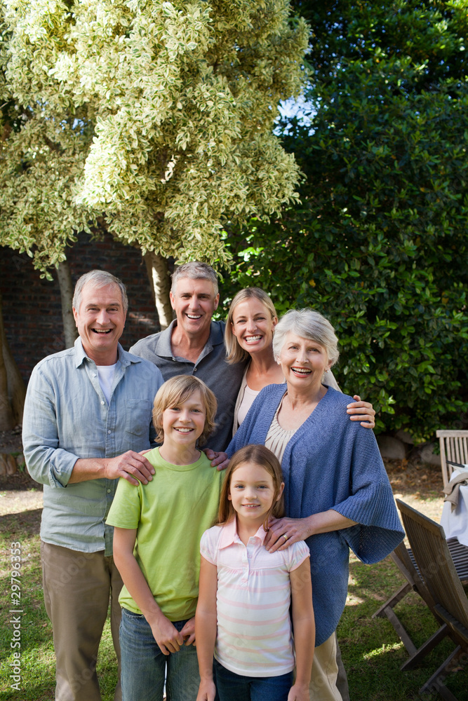 Portrait of a joyful family looking at the camera Portrait of a joyful family looking at the camera