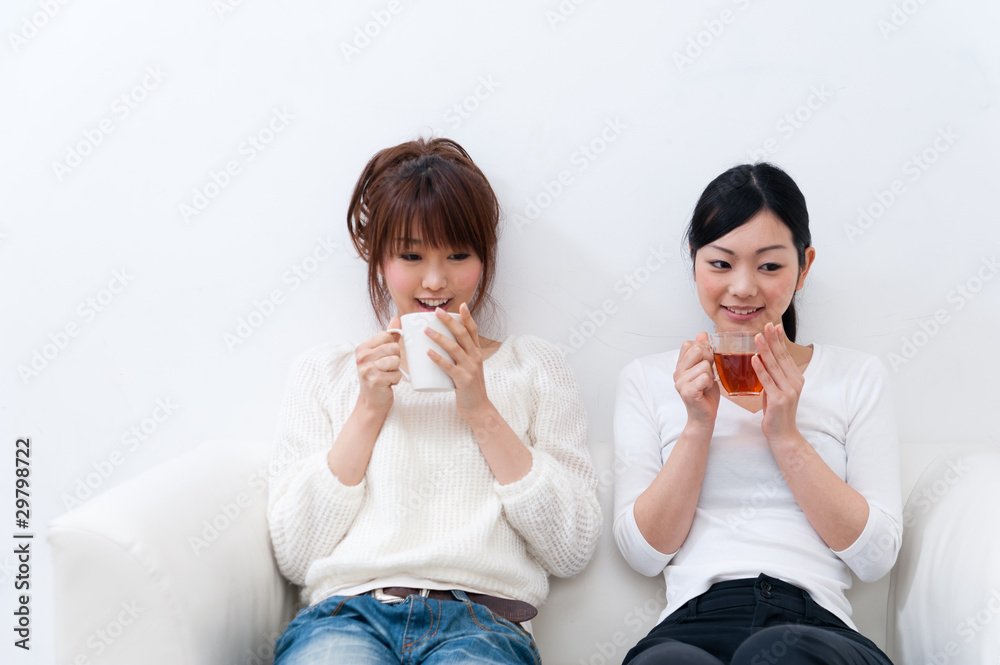 beutiful asian women relaxing on the sofa beutiful asian women relaxing on the sofa