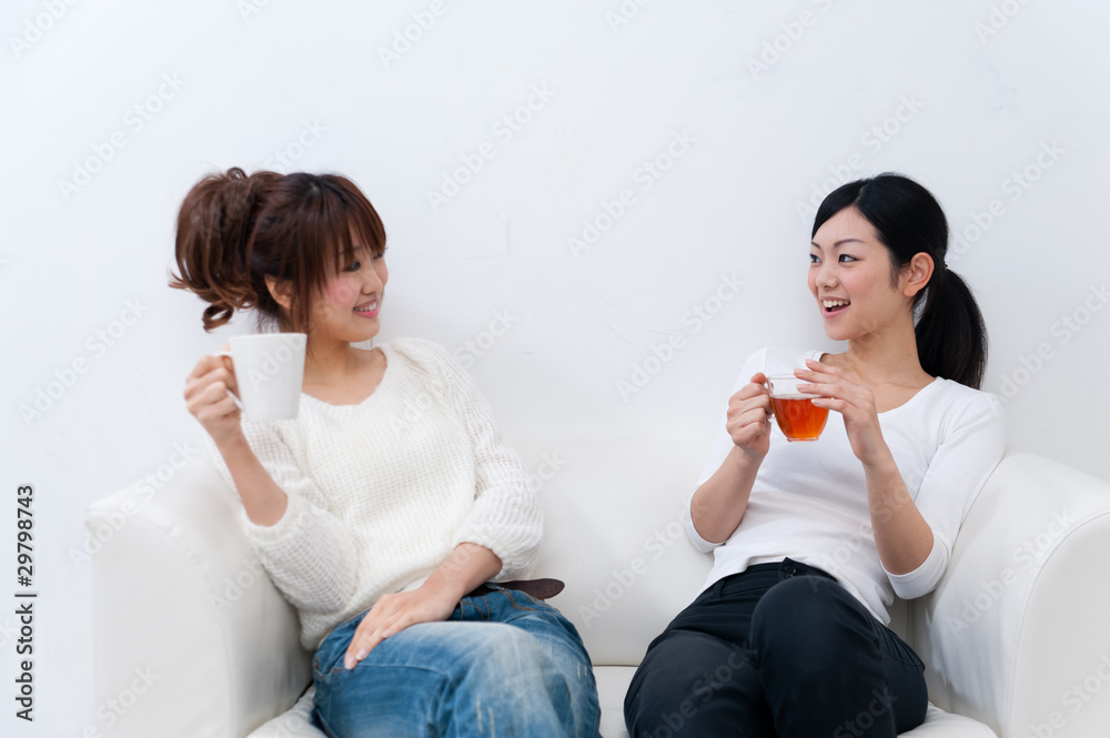 beutiful asian women relaxing on the sofa beutiful asian women relaxing on the sofa