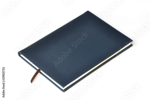 Navy leather notebook on white background