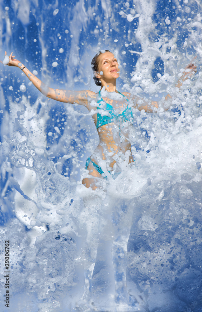 Beautiful Girl in Bikini Refreshes Herself Beautiful Girl in Bikini Refreshes Herself