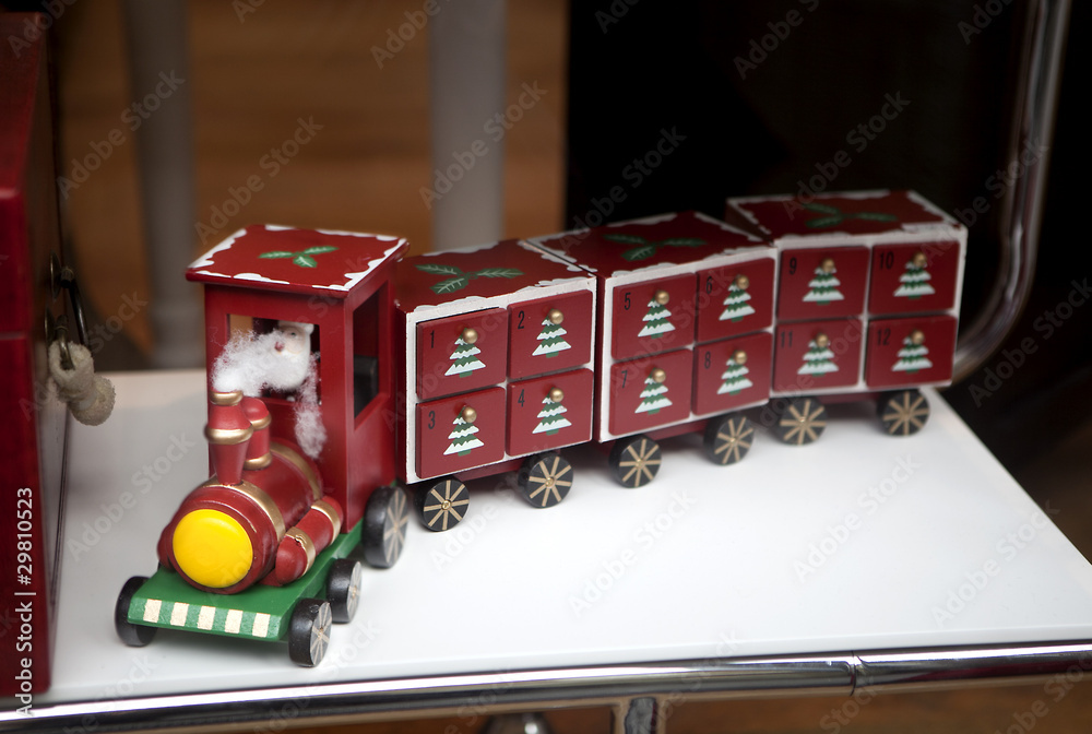 Naklejka premium Vitrina of shop. Train with Santa Claus