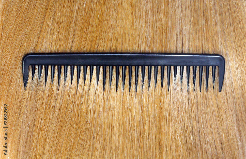 Fototapeta premium Fair hair and comb