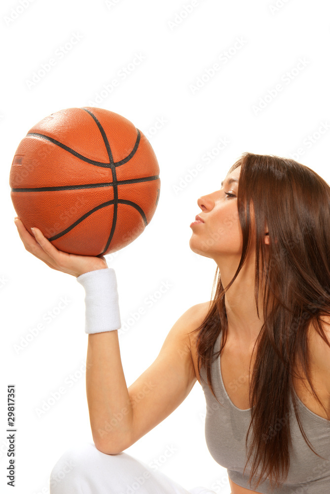Basketball brunette woman player kissing ball Basketball brunette woman player kissing ball