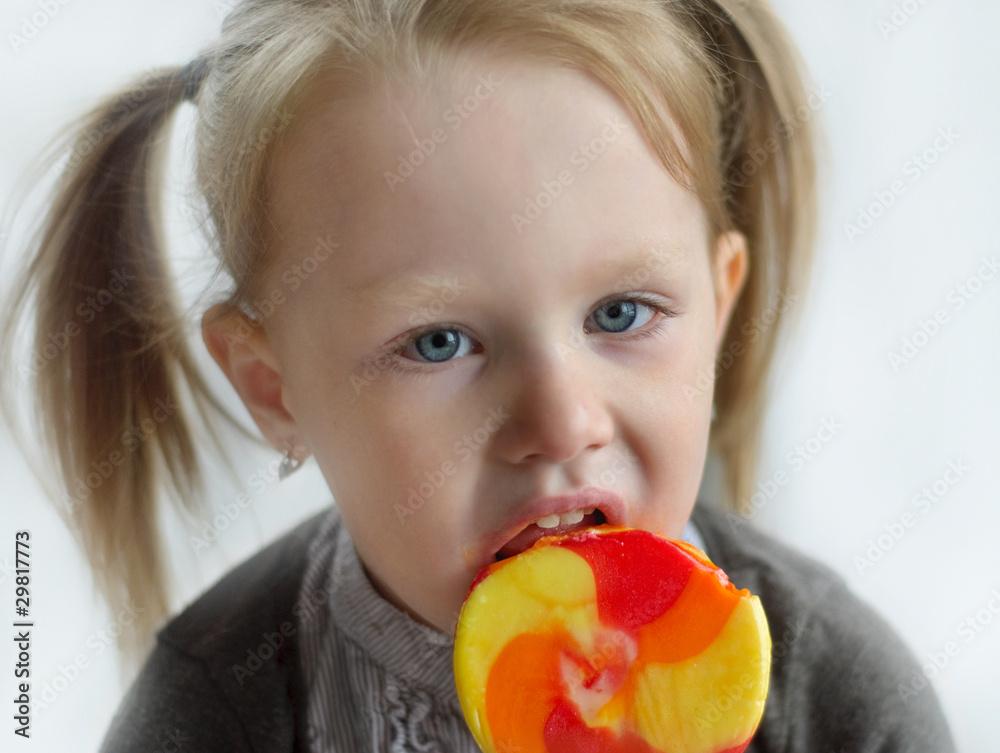 Little girl with candy Little girl with candy