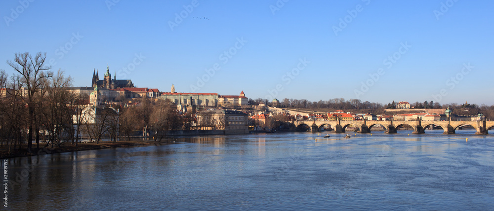 Prague - view of Vltava river and Charles bridge with Prague cas