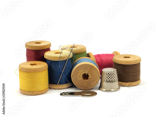 threads, needle and thimble