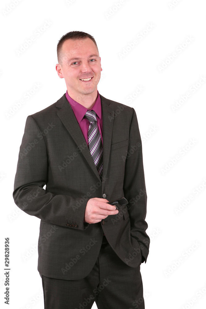 Young businessman using a smart phone Young businessman using a smart phone