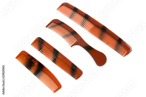 set of brown combs isolated on white background