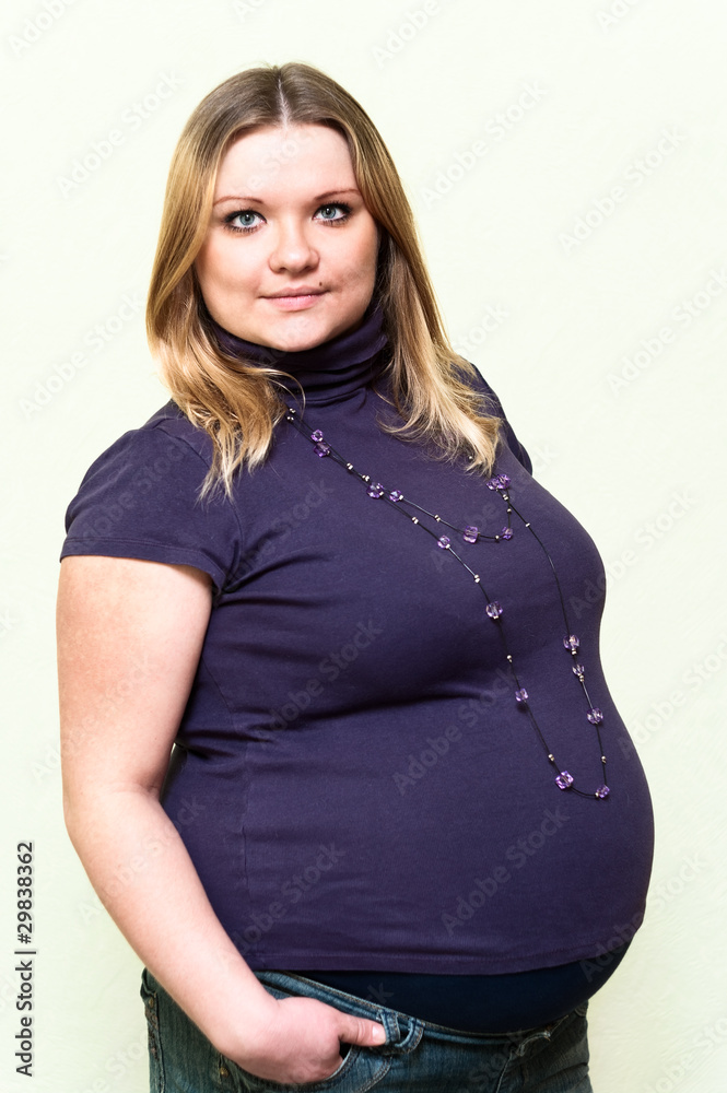 Pregnant young caucasian woman