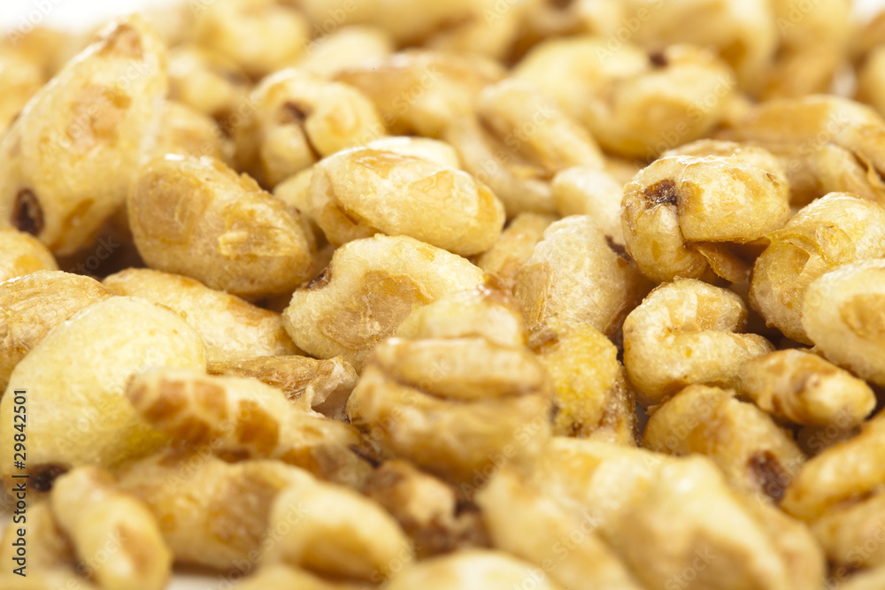 extreme closeup of sweet corn cereals bowl extreme closeup of sweet corn cereals bowl