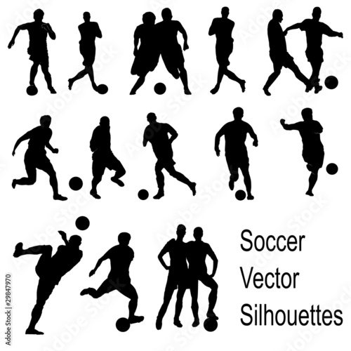 Silhouettes of playing soccer