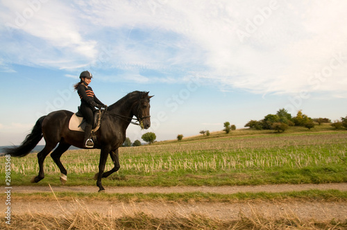 Equestrienne and a horse. © Maria Kondratyeva