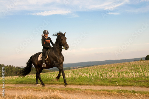 Equestrienne and a horse. © Maria Kondratyeva