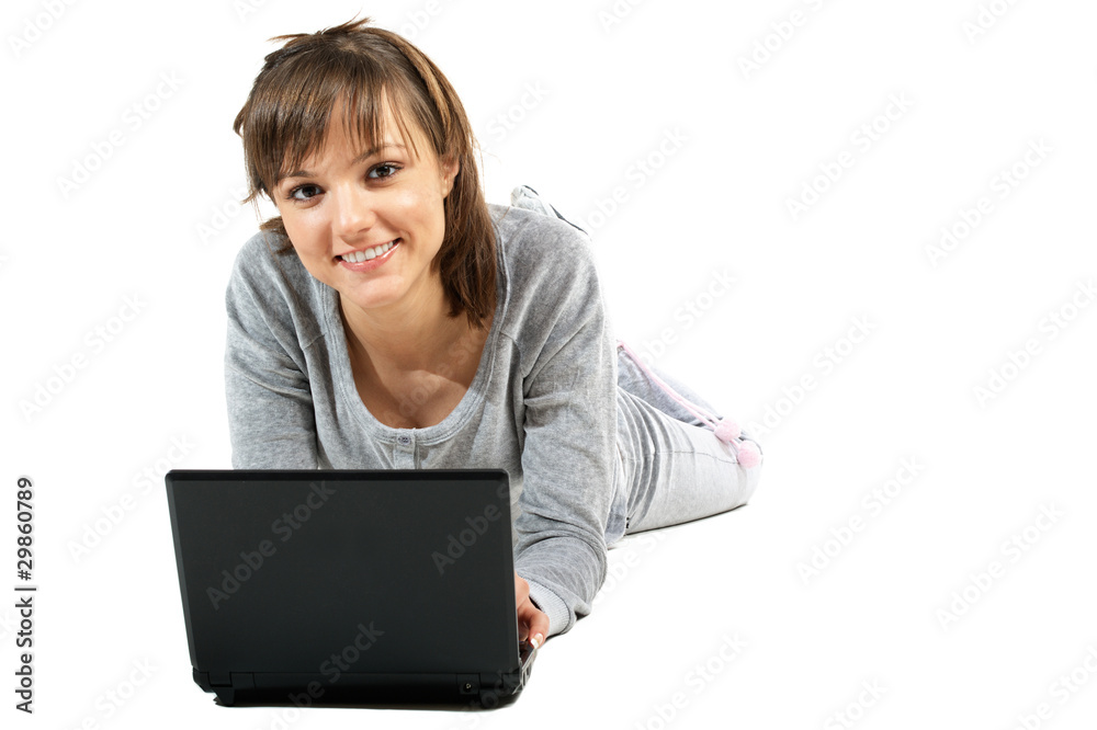 Beautiful young woman in sport suite with laptop Beautiful young woman in sport suite with laptop