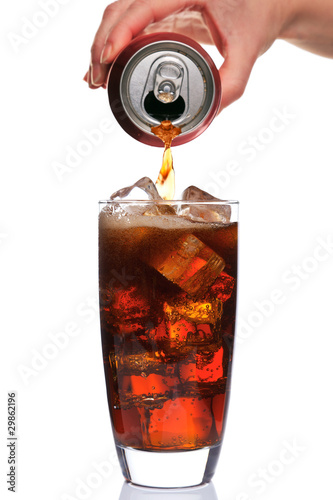 Obraz na plátně Pouring a glass of cola
