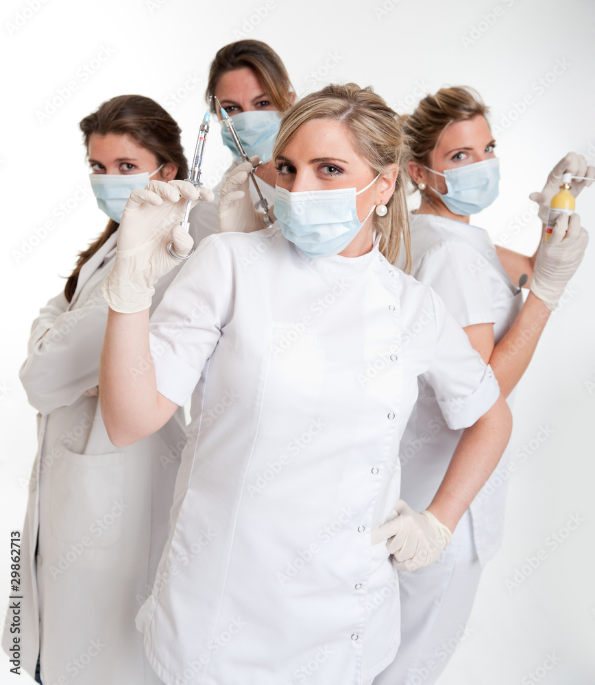 Team of female dentists Team of female dentists