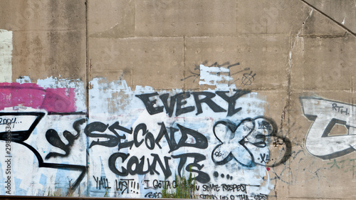 "Every Second Counts" Graffiti on Cement Wall