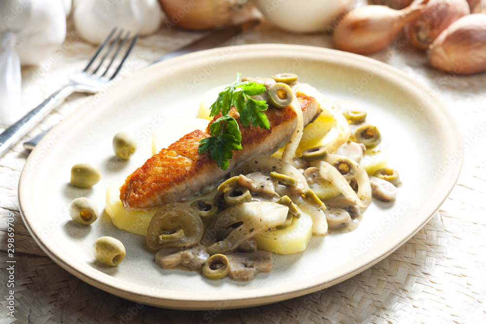 baked salmon on champignons, onion and olives baked salmon on champignons, onion and olives