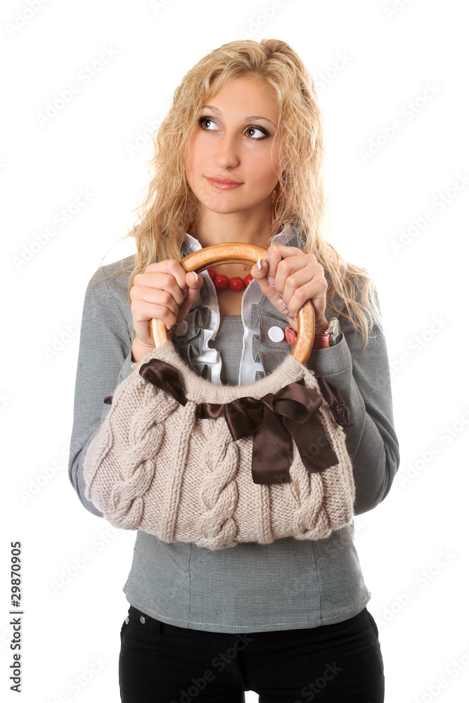 Portrait of attractive blonde with a handbag Portrait of attractive blonde with a handbag