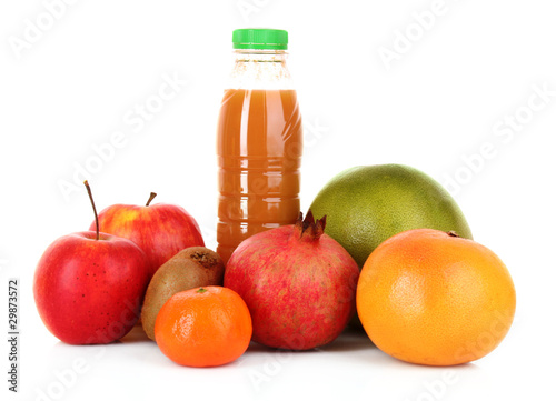 bottle of juice with ripe fruits on white background