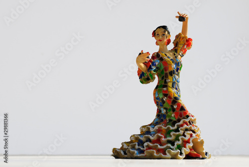 Colorful flamenco dancer with castanets