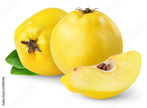 Fototapeta Naklejka Na Ścianę i Meble -  Isolated quince fruits. Cut fresh quinces isolated on white background