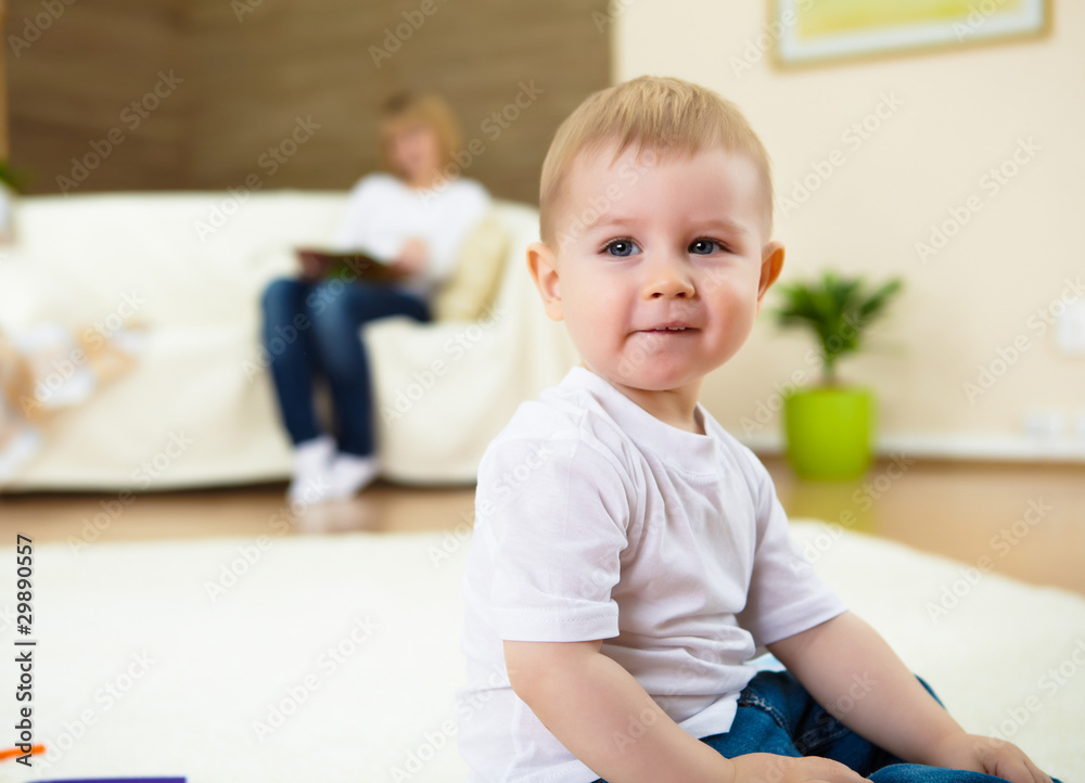 little boy playing on the floor at home little boy playing on the floor at home