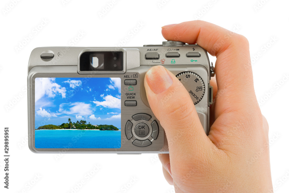 Hand with camera and landscape (my photo) Hand with camera and landscape (my photo)