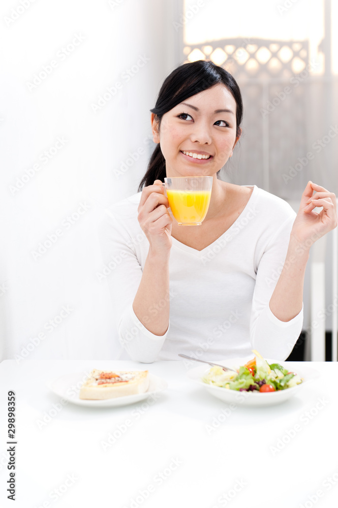 beautiful asian woman eating breakfast beautiful asian woman eating breakfast