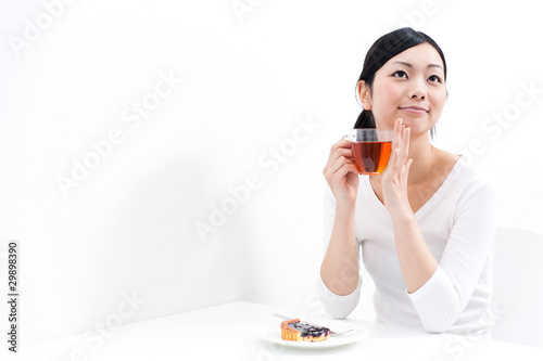 beautiful asian woman drinking a tea