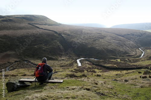 Man looking at a scenic view in Peak District, UK