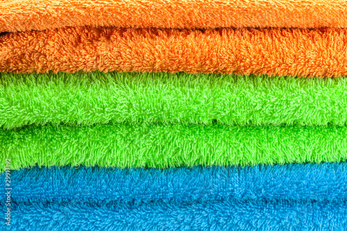 background of the three multi colored terry towels