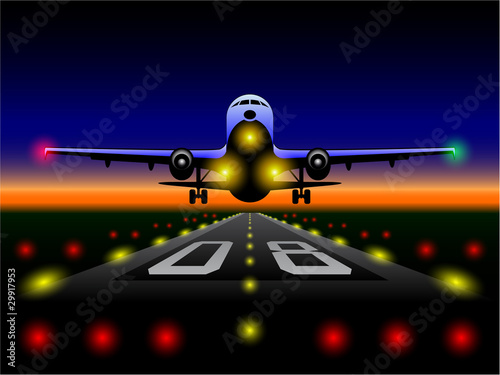 Airliner landing at sunset